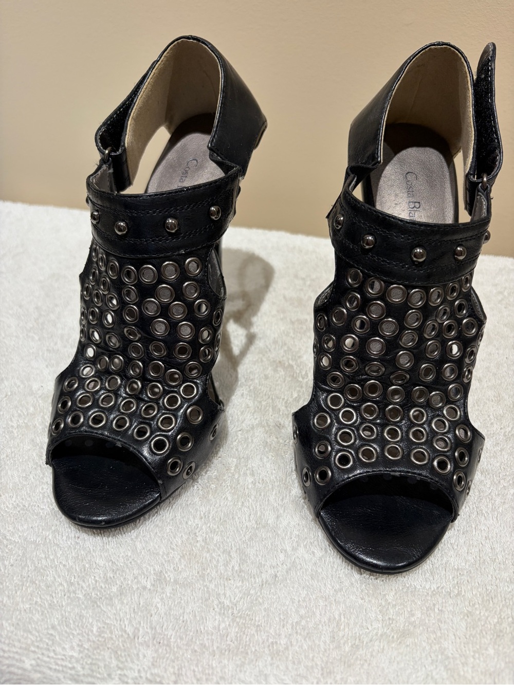 Costa Blanca Black Grommet Peep-Toe Ankle Heels